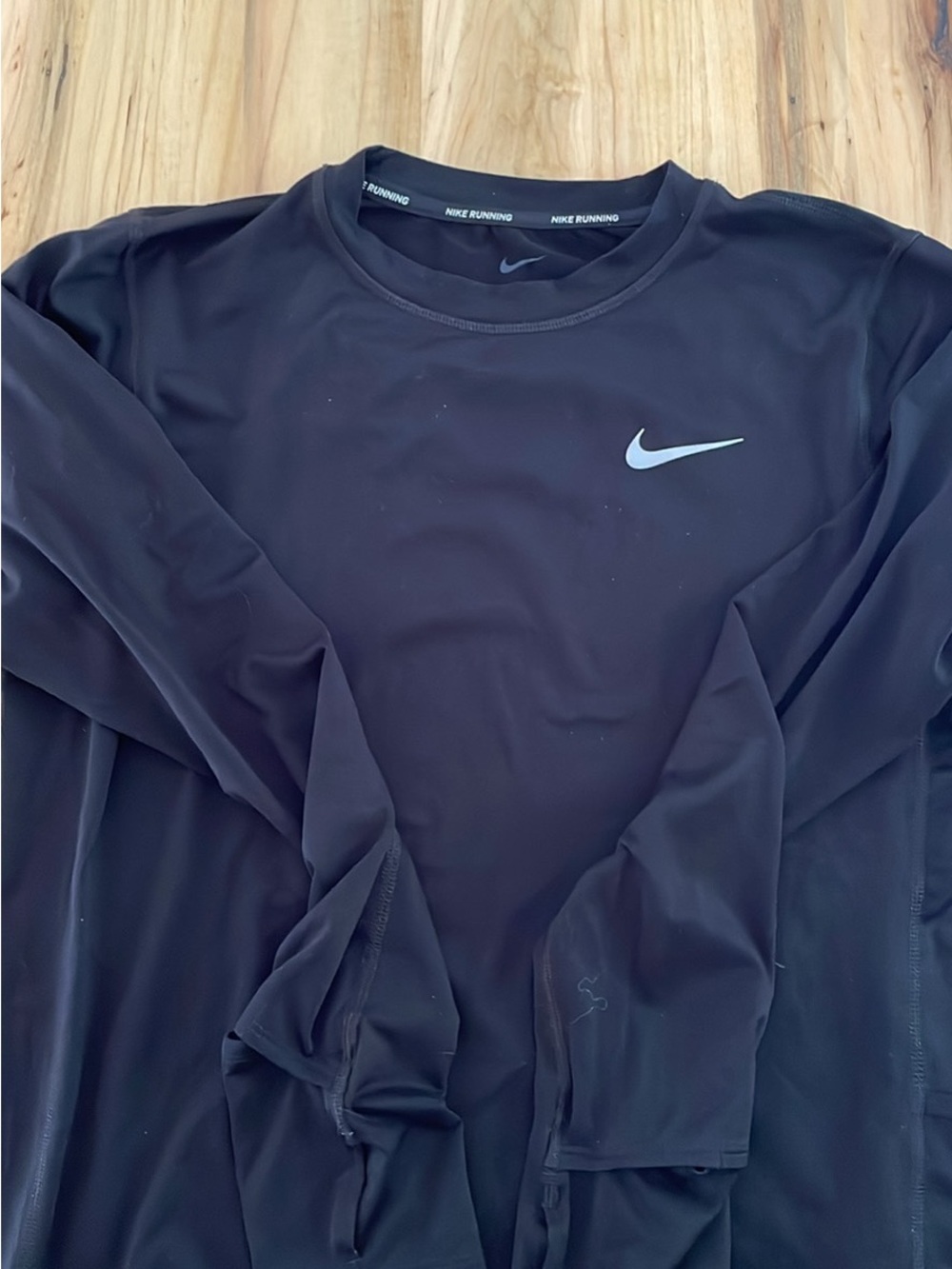 Nike Women’s Black Long-Sleeve Running Top with Silver Swoosh